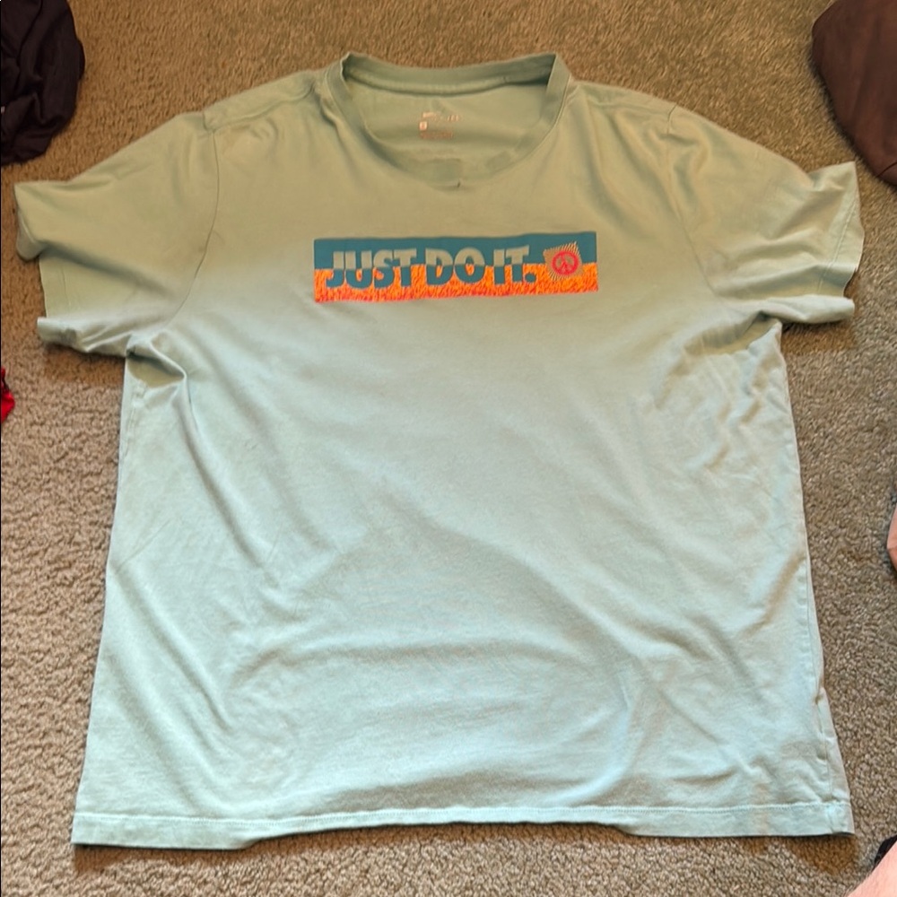 Nike Sky Blue Tee with Orange and Blue Graphic